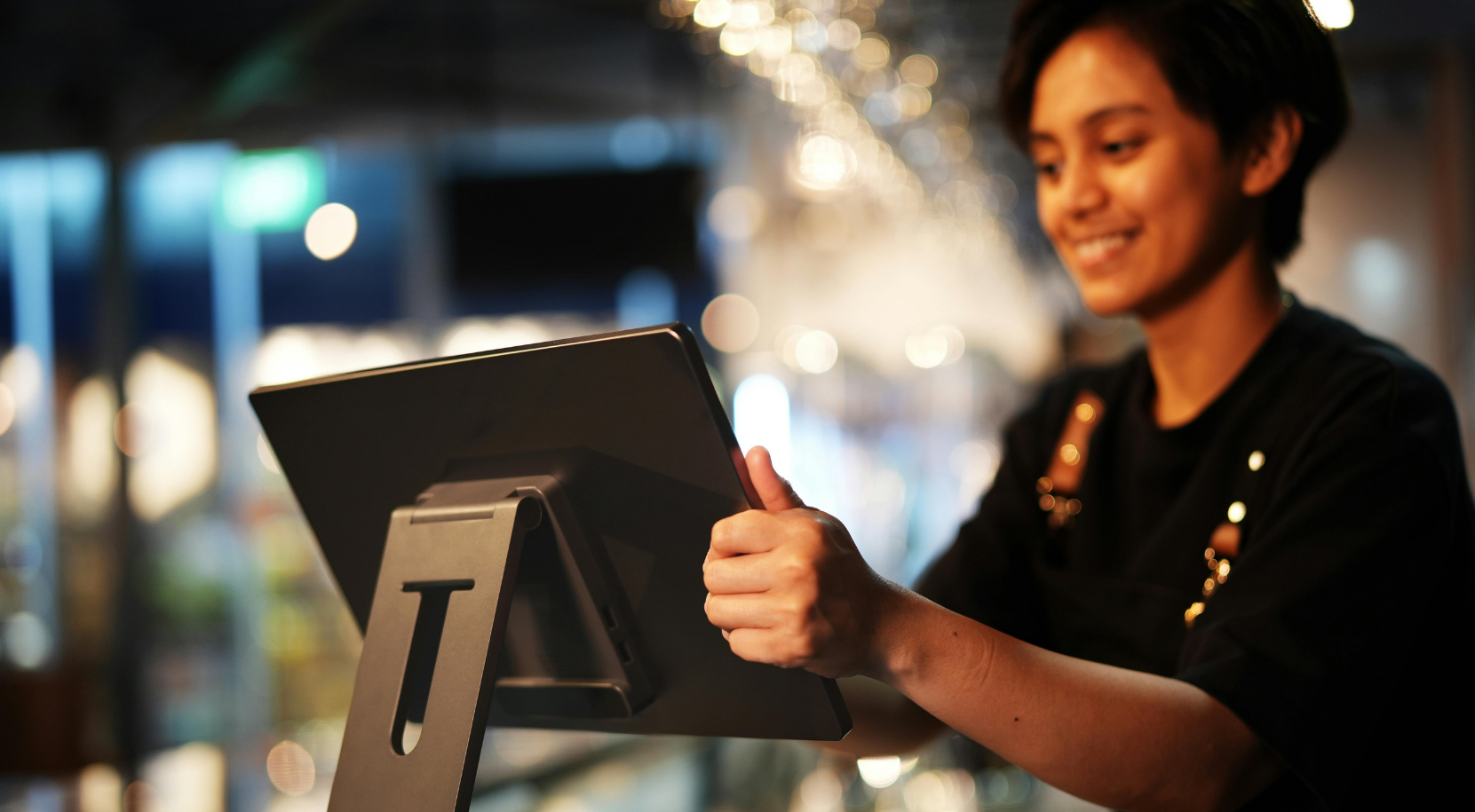 Restaurant staff using tablet technology